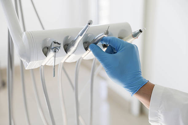 Professional Emergency Dentist technician working in Weatherby Lake, MO